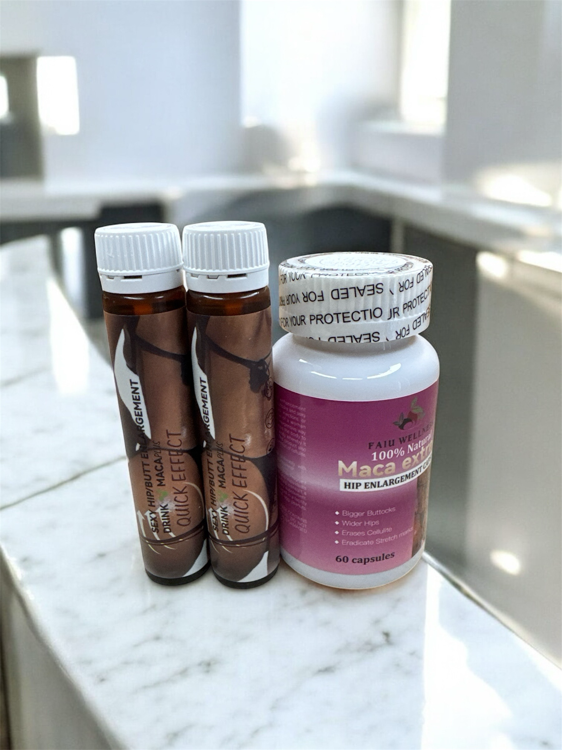 Maca Grosi Dada supplement bottle and Siwo Booster ampoules on marble surface